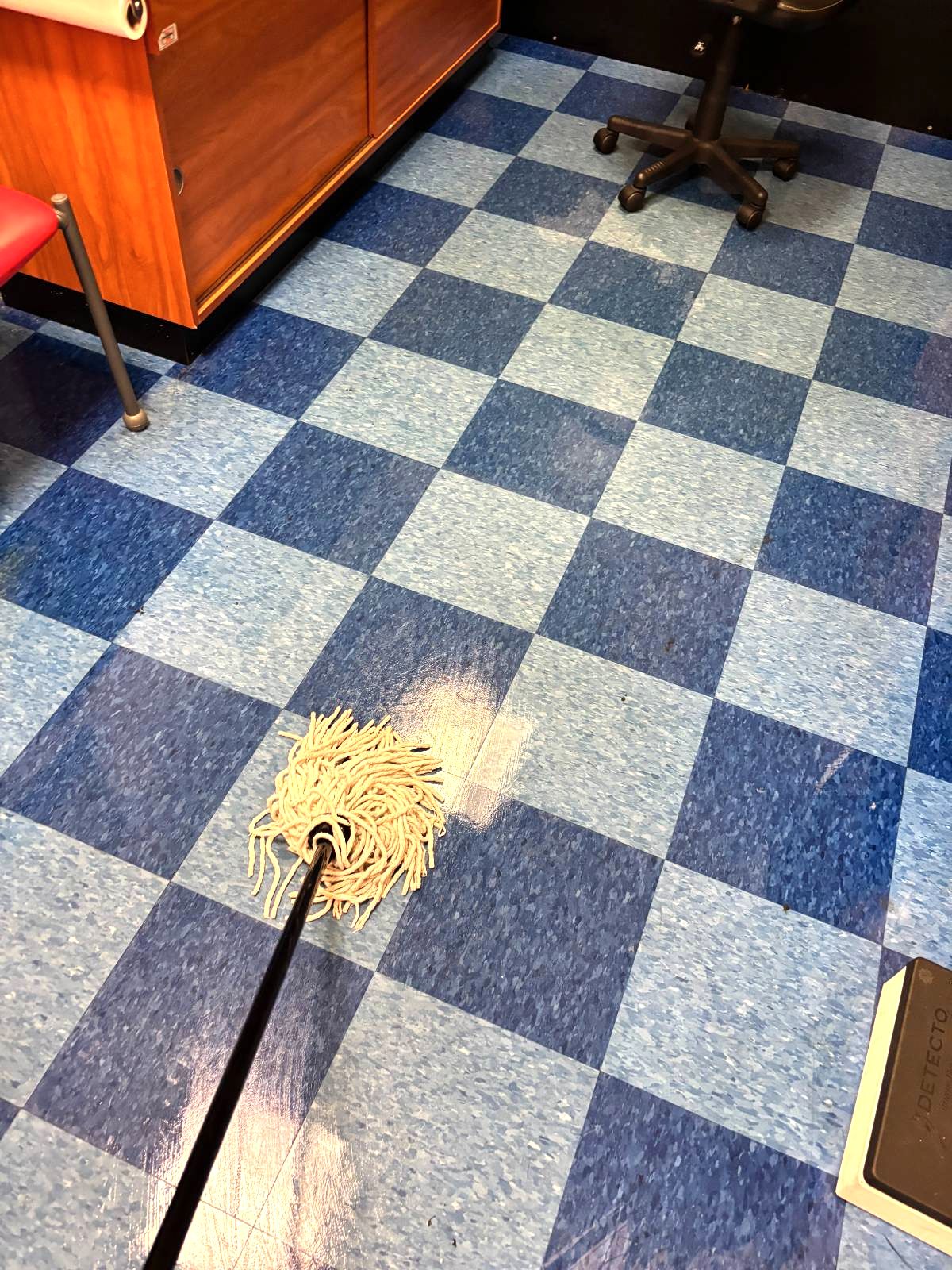 Office floor mopped clean by Delightful Cleaning LLC